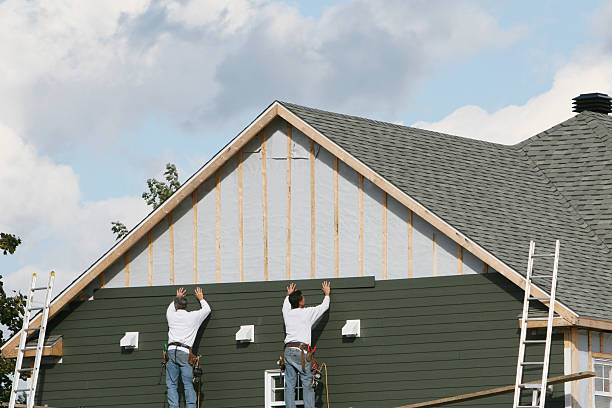Professional Siding technician working in Stoughton, MA